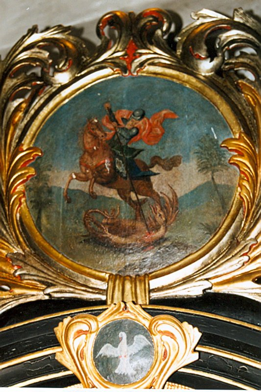 Sv. Juraj bojuje s drakom, neznámy autor, tempera na dreve, záver 17. stor. (?), kartuša nadstavca hlavného oltára Panny Márie z Kostola sv. Juraja v Kostoľanoch pod Tríbečom, foto: P. Kršák